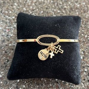 Faith gold clasp bracelet.